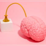 Мозок, що заряджається через розетку, символізуючи дофаміновий вплив